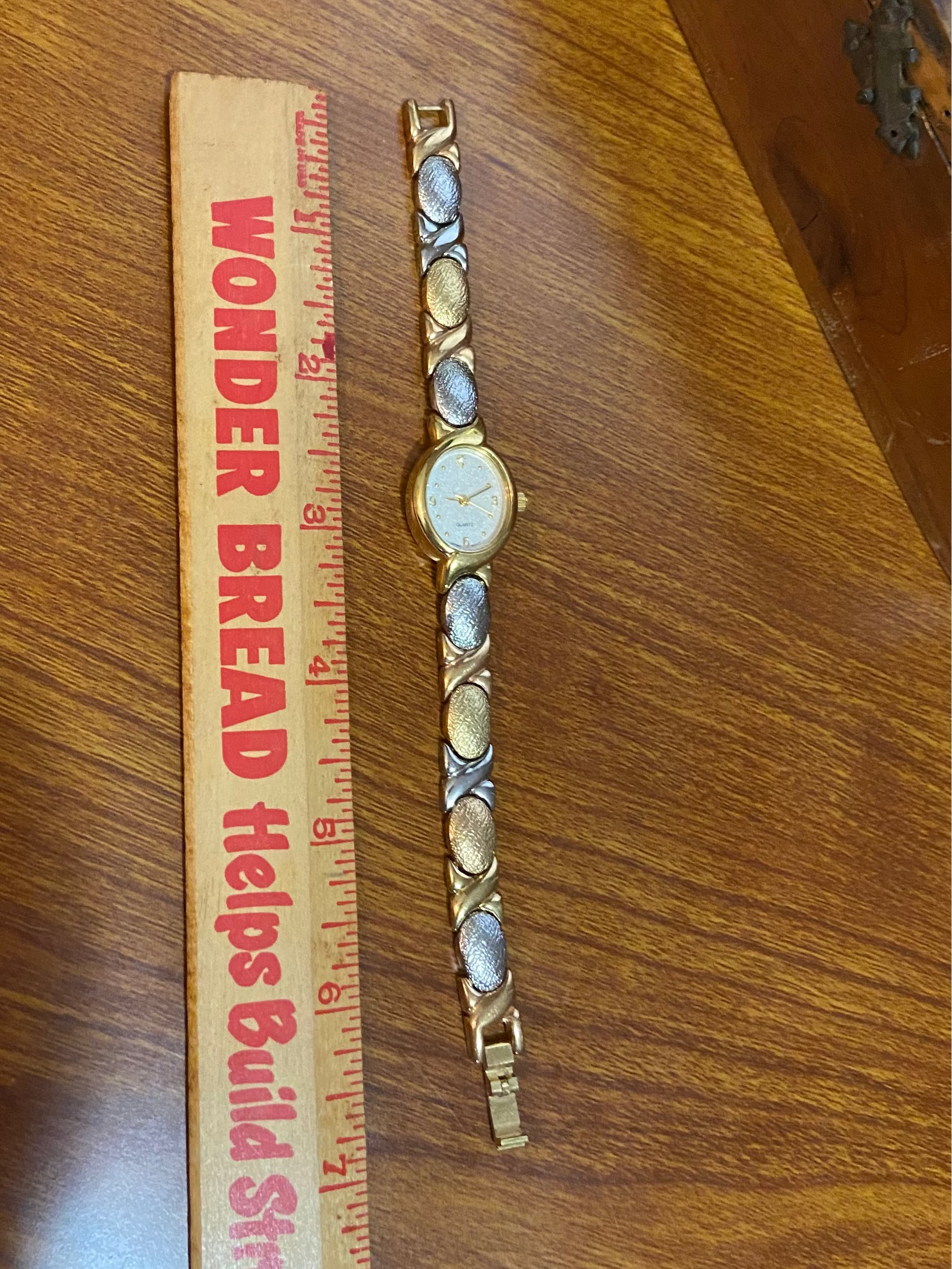 Oval face silver and gold